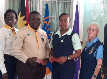 Two young people from uniformed bodies receive Guiding Light Award